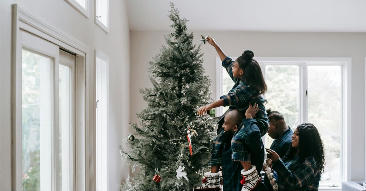 Family decorating tree